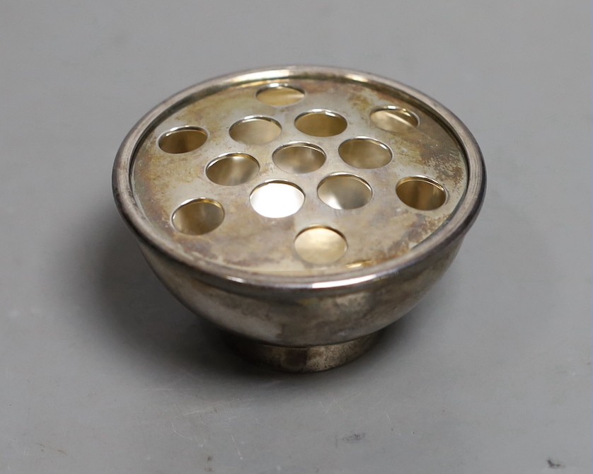 Gerald Benney. A silver cigarette dispenser, of circular bowl form, London, 1978, width 65mm, 116 grams.